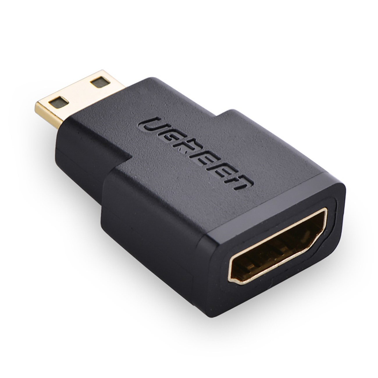 Adaptor Ugreen 20101 cu conectori mini HDMI (mascul) / HDMI (femei) - negru pe fundal alb